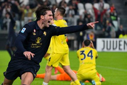 Vlahovic celebrating Lazio's own-goal