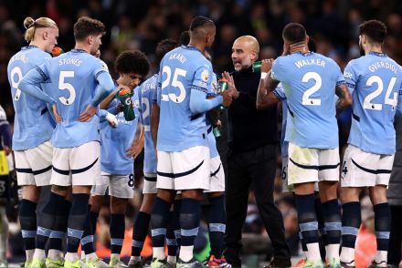 Guardiola with his Man City players