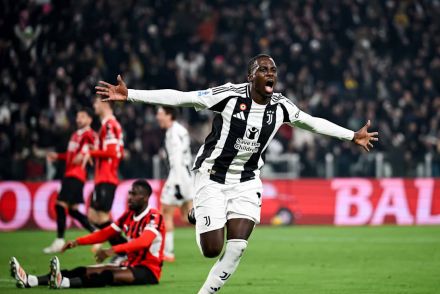 Timothy Weah celebrates scoring against Milan