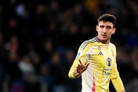 Andrea Cambiaso looking on