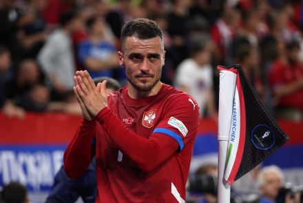 Filip Kostic applauding Serbian fans