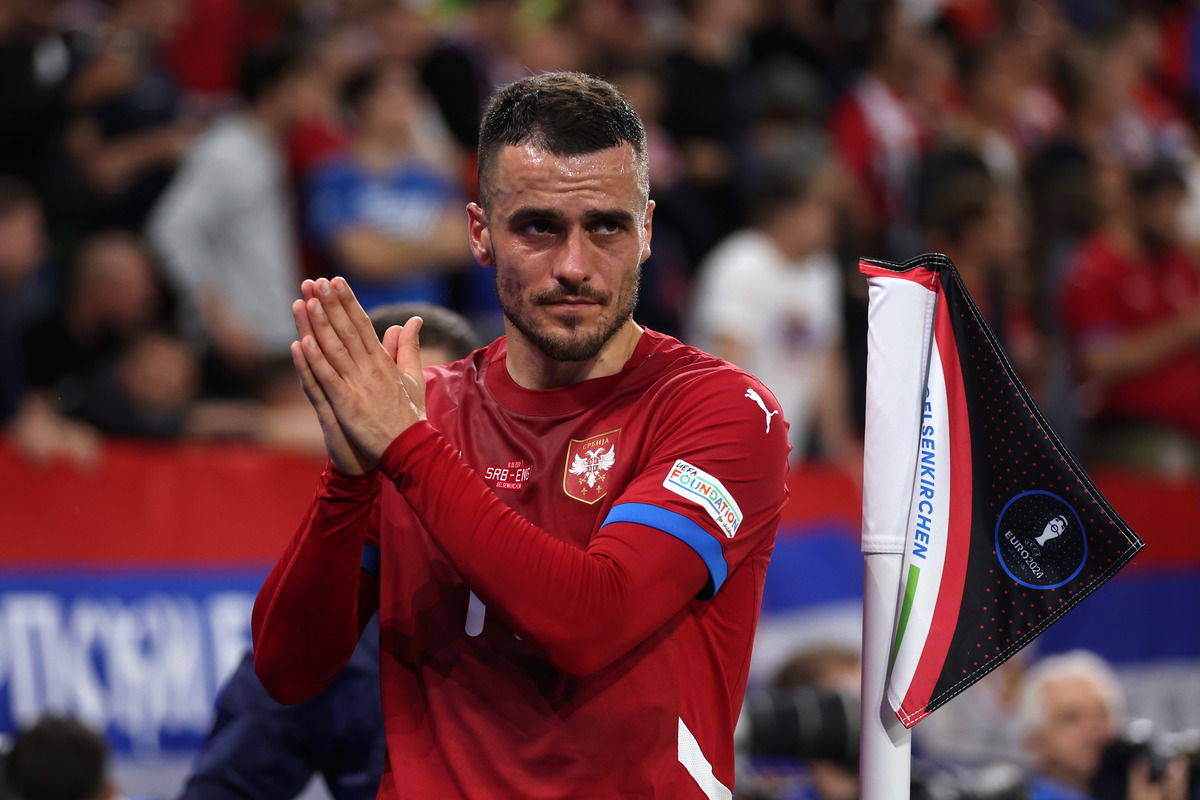 Filip Kostic applauding Serbian fans