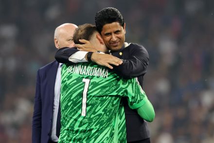 Gianluigi Donnarumma hugging PSG president