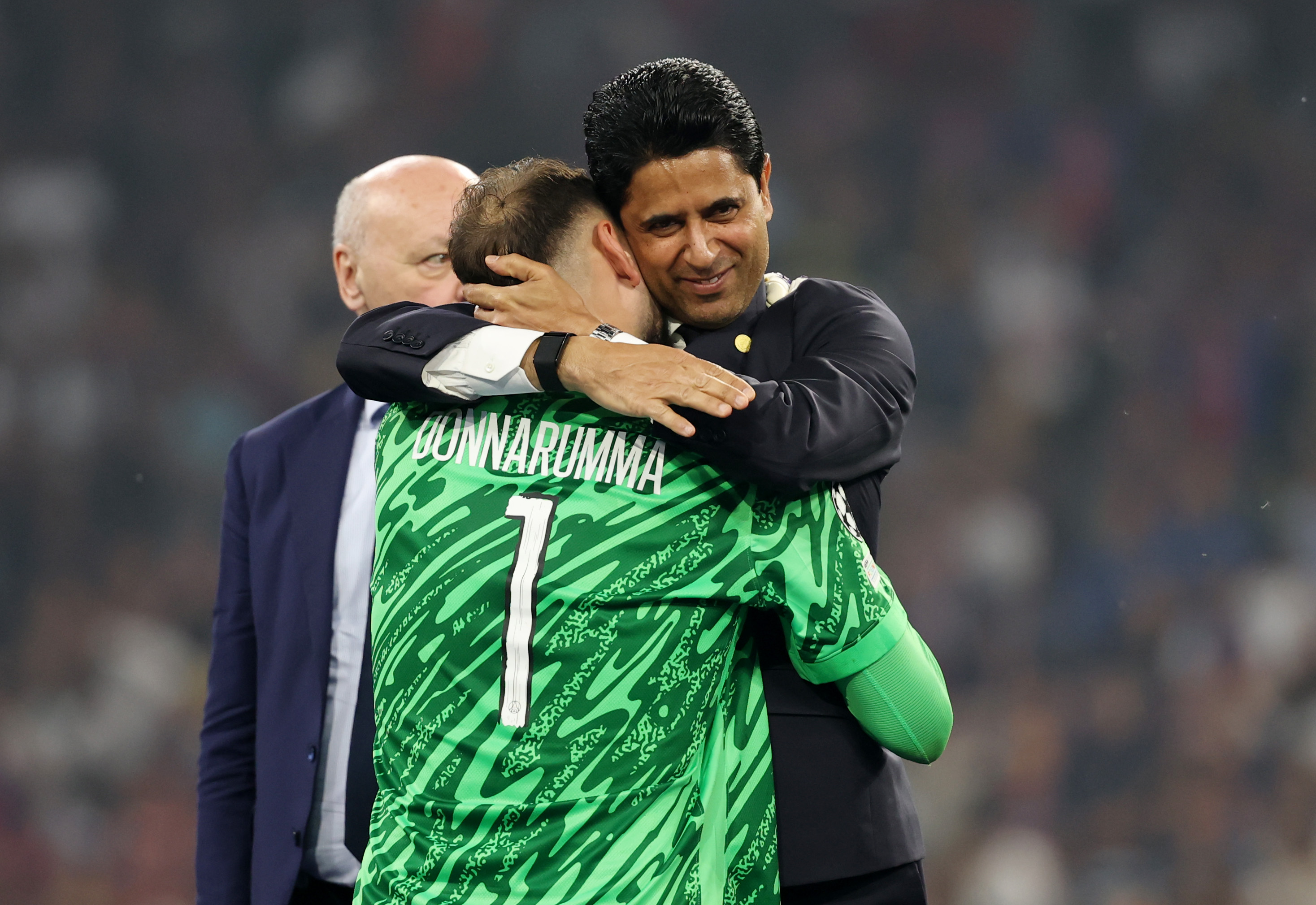 Gianluigi Donnarumma hugging PSG president