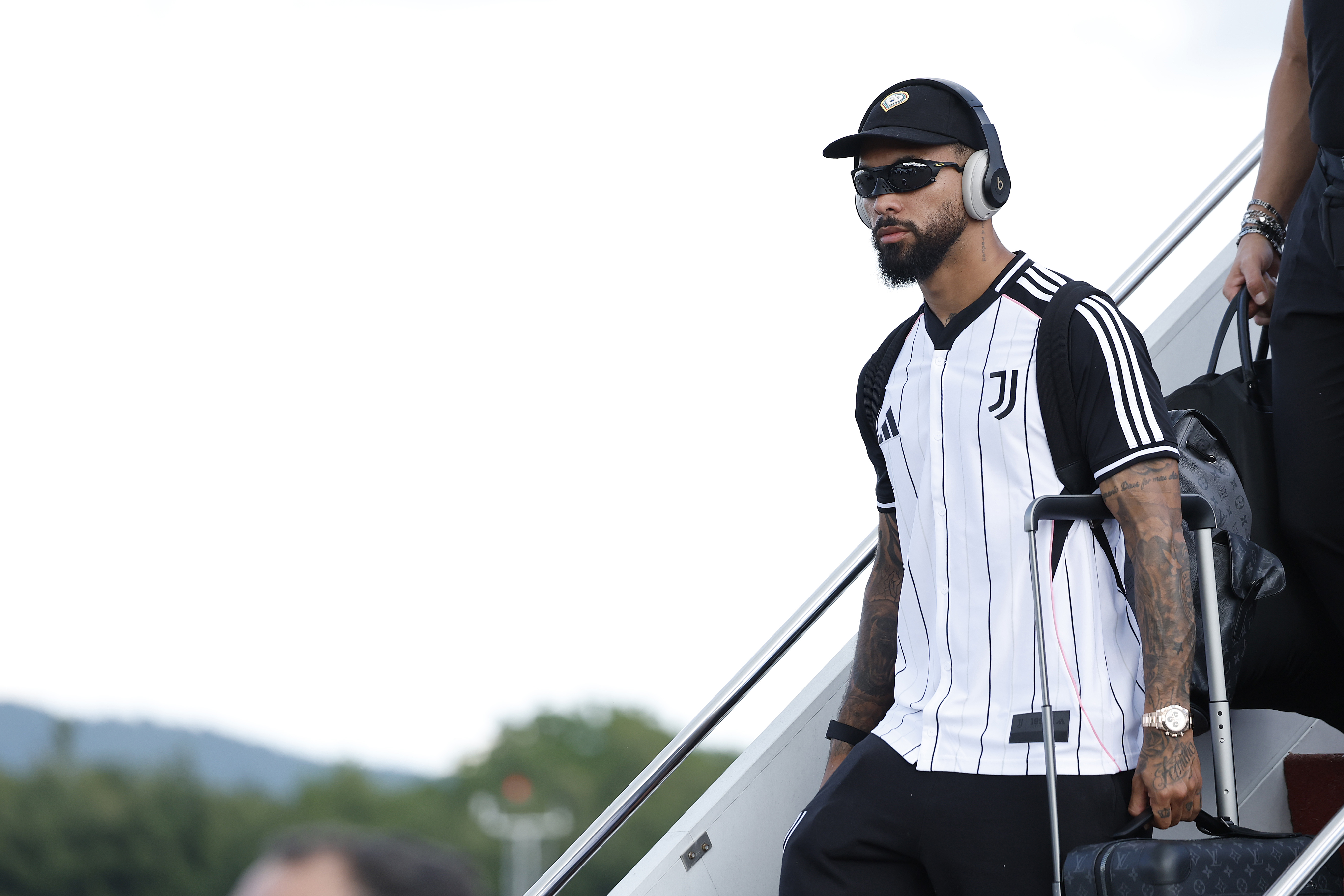 Douglas Luiz at the airport