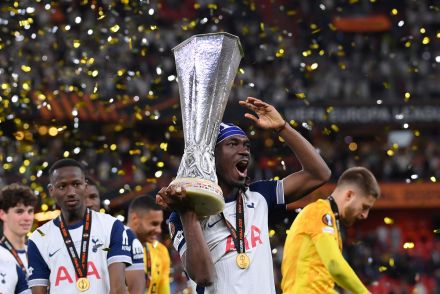 Yves Bissouma lifts the Europa League trophy