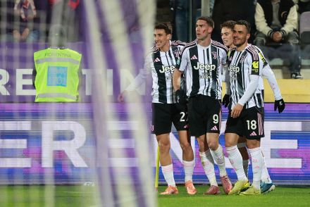 Filip Kostic celebrating with Juventus teammates