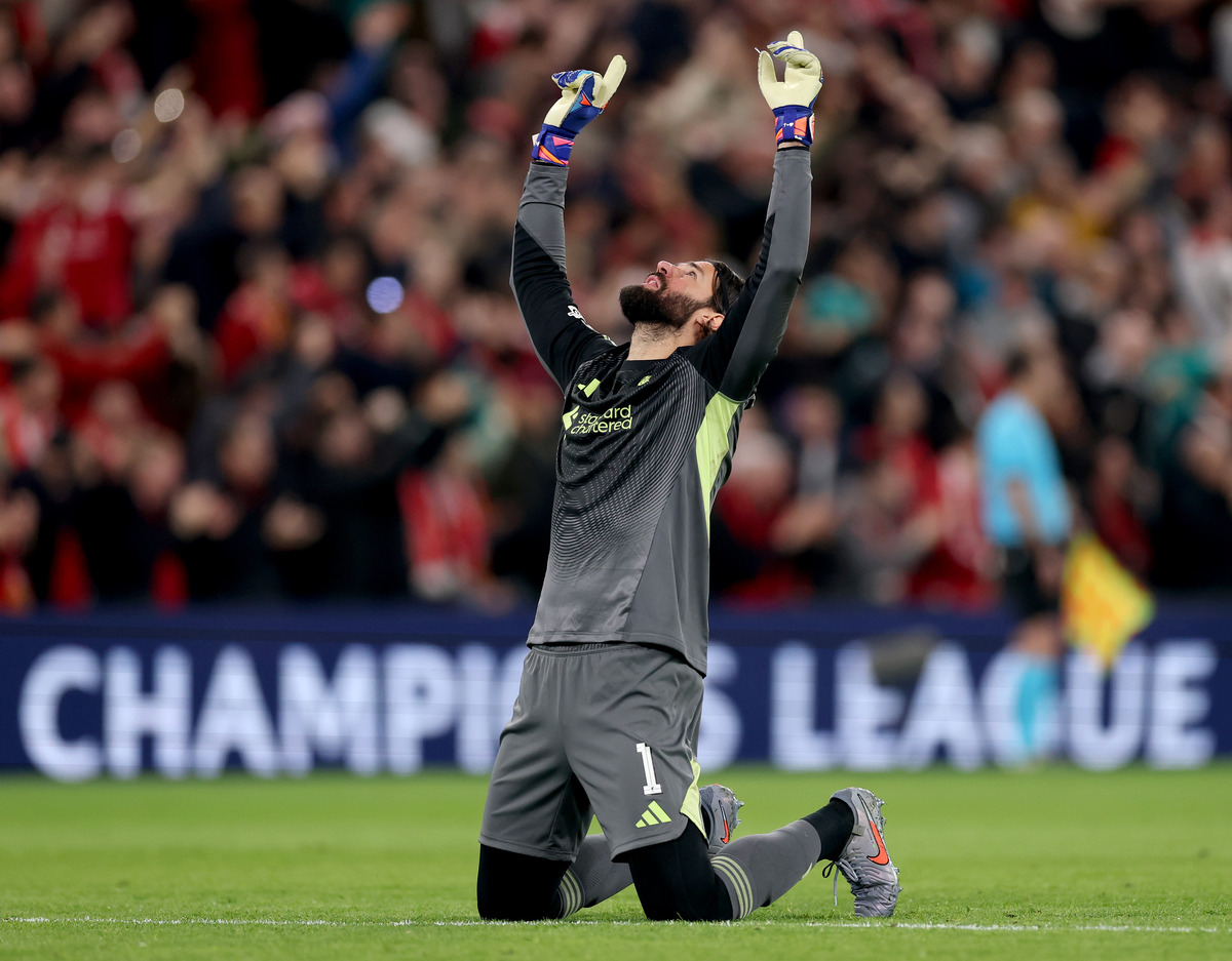 Alisson Becker celebrating Liverpool victory