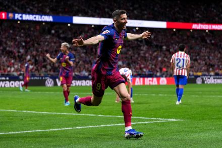 Robert Lewandowski celebrates scoring against Atletico Madrid
