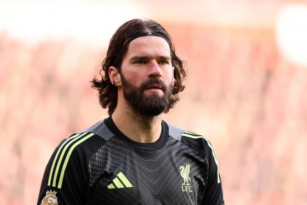 Alisson looking on